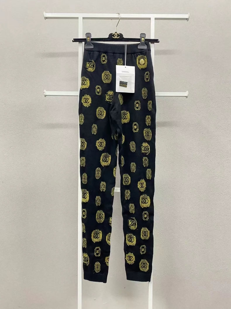 Chanel 21a Black and Gold Graffiti Cashmere Knit Pants