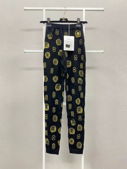 Chanel 21a Black and Gold Graffiti Cashmere Knit Pants