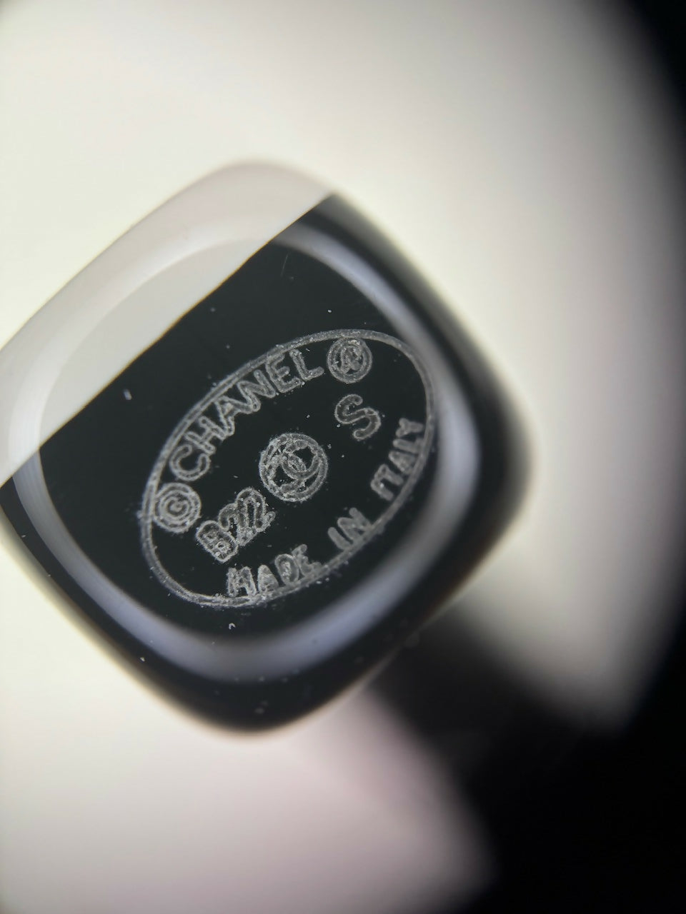 Chanel B22S Resin White Curved COCO Motif Hoop Stud Earrings