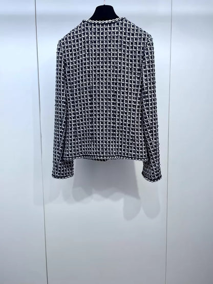Chanel 25C black and white checkered tweed jacket