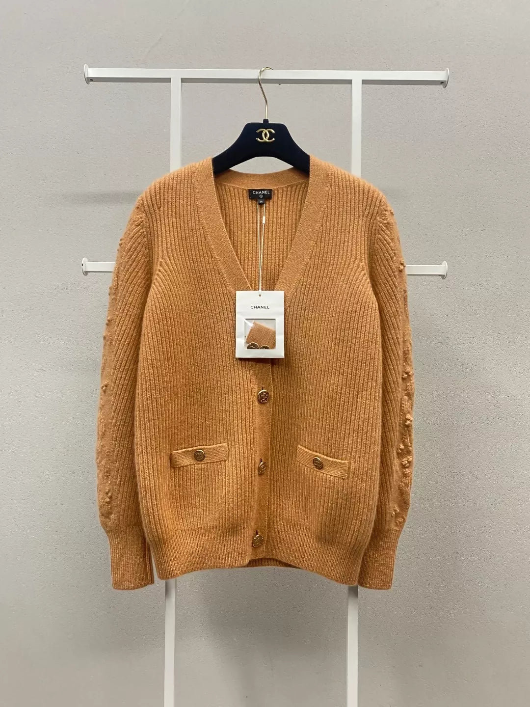 Chanel 21A Castle series orange printed knitted cardigan