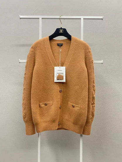 Chanel 21A Castle series orange printed knitted cardigan