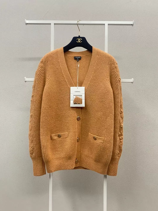 Chanel 21A Castle series orange printed knitted cardigan