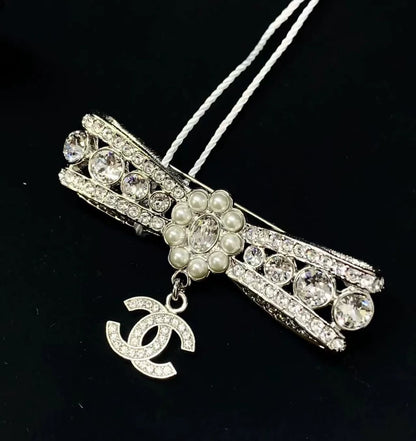 Chanel 23a brooch bow adorned with Swarovski crystals