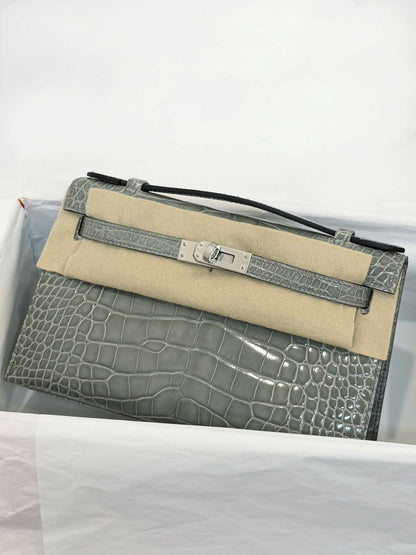 Hermès Kelly pochette Gris Plomb / Gris Micro Shiny Crocodile with Palladium Hardware