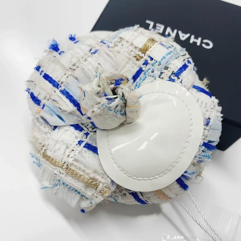 Vintage Chanel camellia brooch from the 2018 Cascade Collection in woven fabric - New and never used