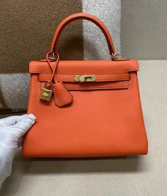 Hermès kelly 25 Feu Togo Gold hardware