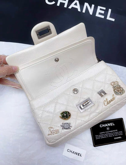 Chanel Pearl White Quilted Leather Limited Edition Lucky Charm Reissue 2.55 Classic Flap Bag