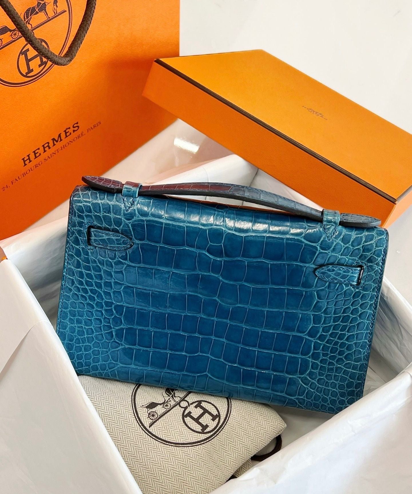 Hermes Kelly Pochette Blue Colvert shiny crocodile leather gold hardware