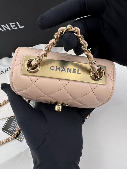 Chanel peach quilted leather coin purse with gold chain strap