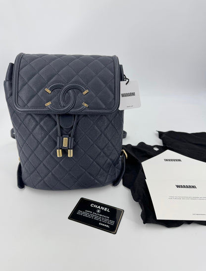 Chanel Dark Blue leather backpack with gold hardware