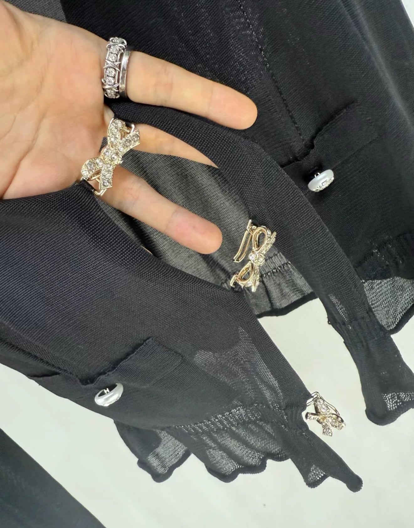 Chanel 23S black bow rhinestone top