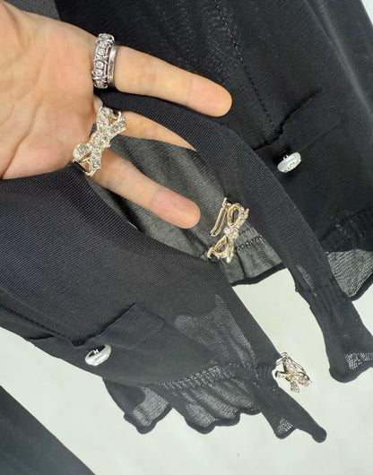 Chanel 23S black bow rhinestone top