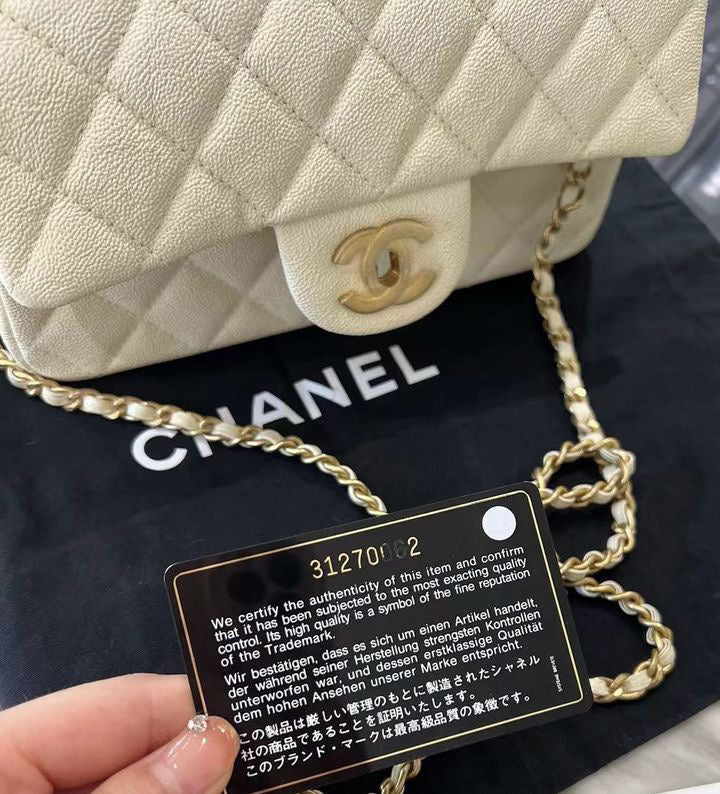 Chanel 21S White / Ivory Caviar Quilted Mini Top Handle Aged Gold Hardware