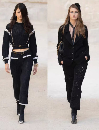 Chanel black camellia knit trousers