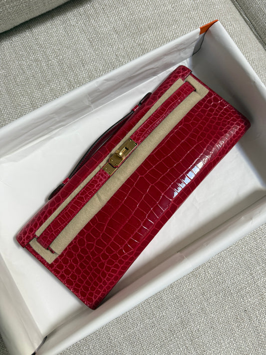 Hermes Kelly Cut Braise shiny porosus gold hardware