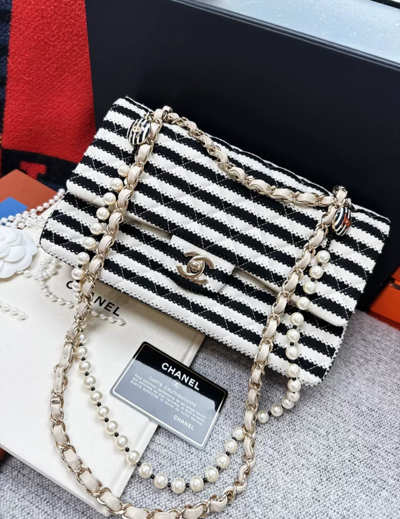 Chanel 14C Black 
White Striped Flap Bag