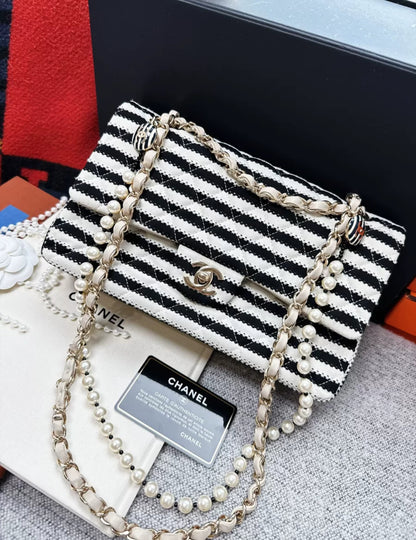 Chanel 14C Black 
White Striped Flap Bag