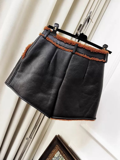 Chanel 23k black and brown shearling shorts
