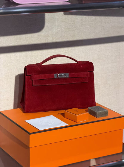 Hermes Kelly pochette red Doblis suede leather palladium hardware