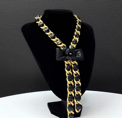 Chanel 20A tie style gold & black ribbon bow with camellia flower leather chain necklace