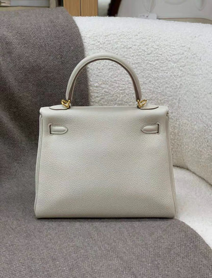 HERMÈS Kelly 25 in Craie Togo leather with Gold hardware