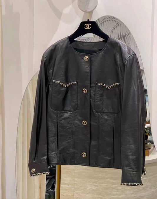 Chanel 24B black leather jacket with chain