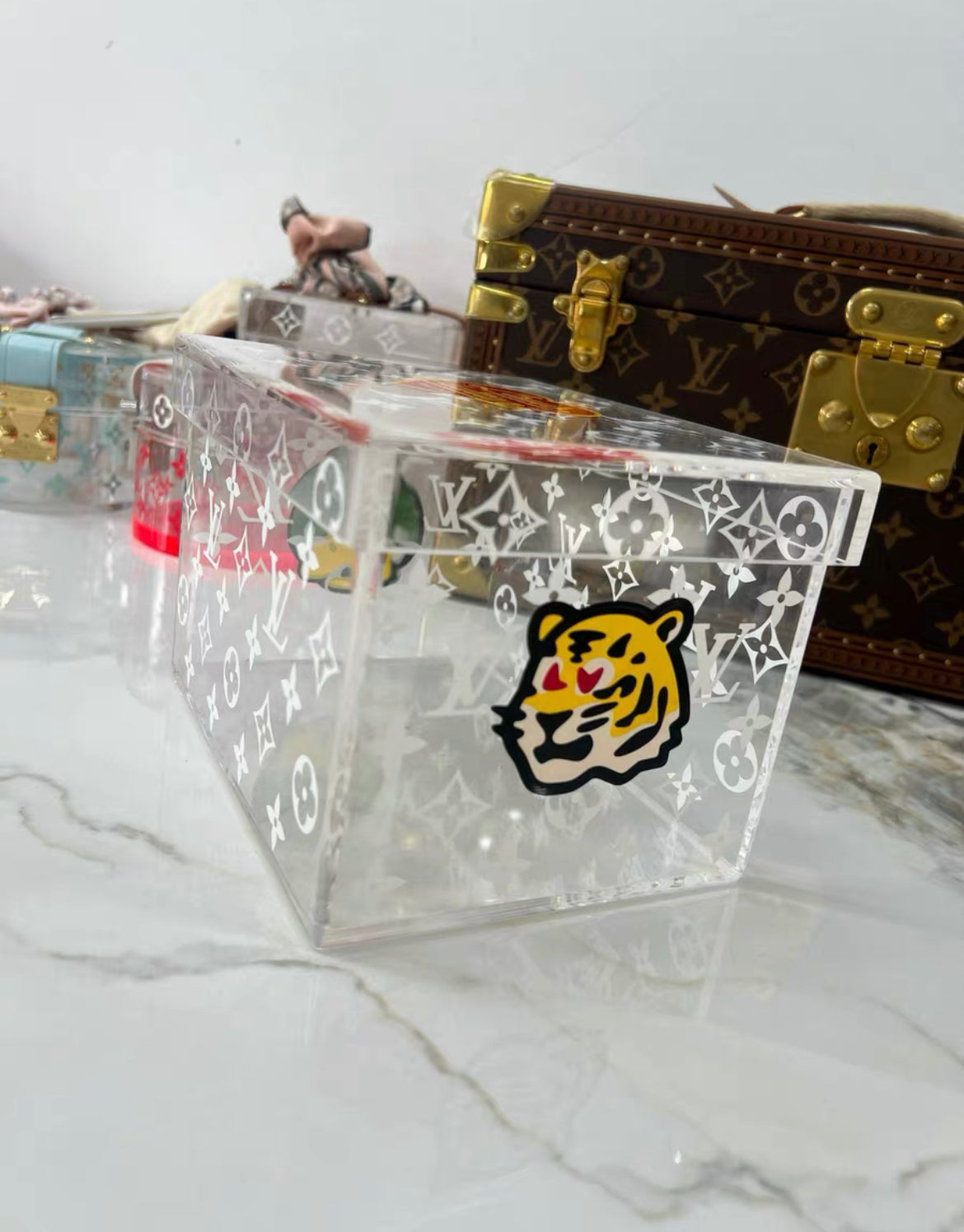 Louis Vuitton Nigo transparent box with duck and tiger characters