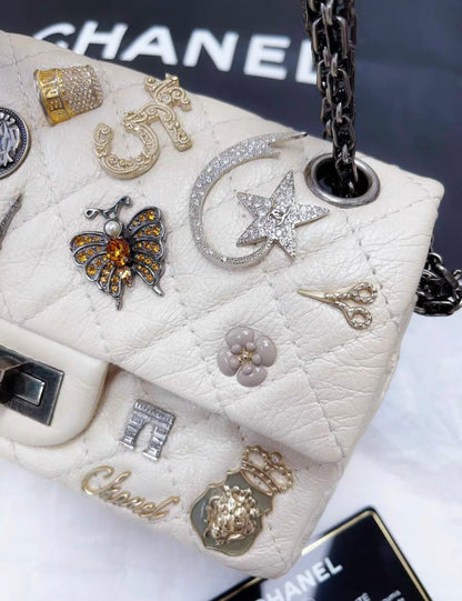 Chanel Pearl White Quilted Leather Limited Edition Lucky Charm Reissue 2.55 Classic Flap Bag