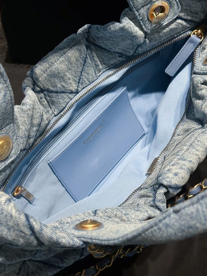 Chanel 25 light blue denim bow bag with gold hardware chain