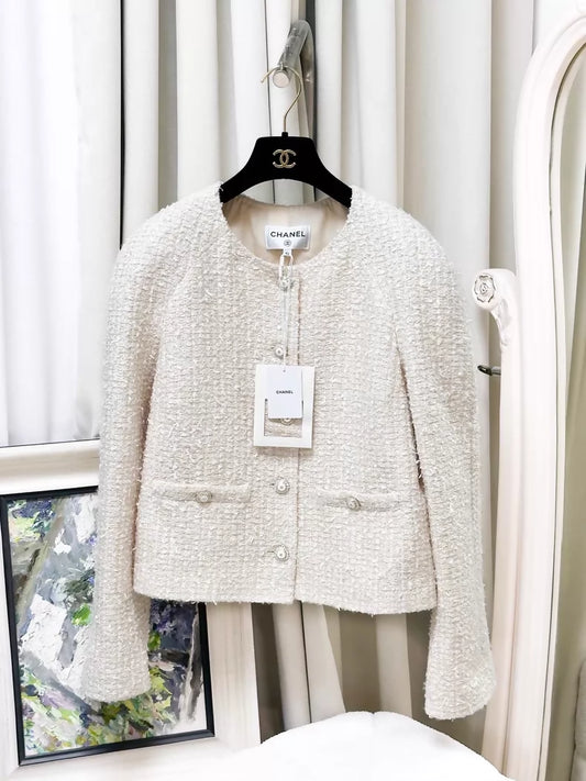 Chanel 25K beige tweed jacket