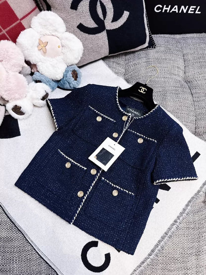 Chanel 25A navy blue tweed vest with fine shimmer and white gold trim