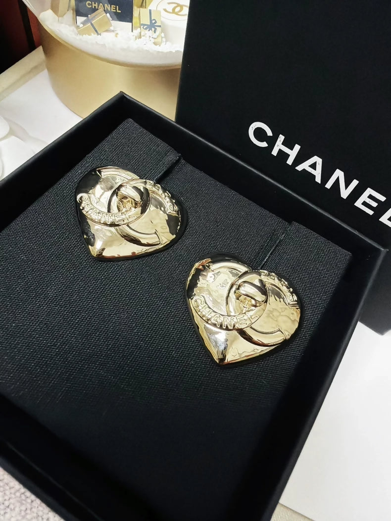 Chanel 22 light gold heart-shaped backpack clasp metal earrings