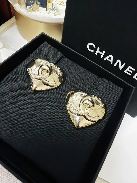 Chanel 22 light gold heart-shaped backpack clasp metal earrings