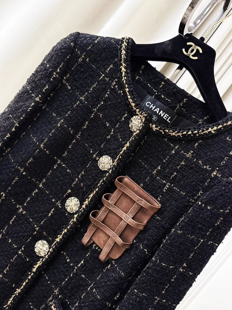 Chanel 16k black and gold tweed and leather jacket