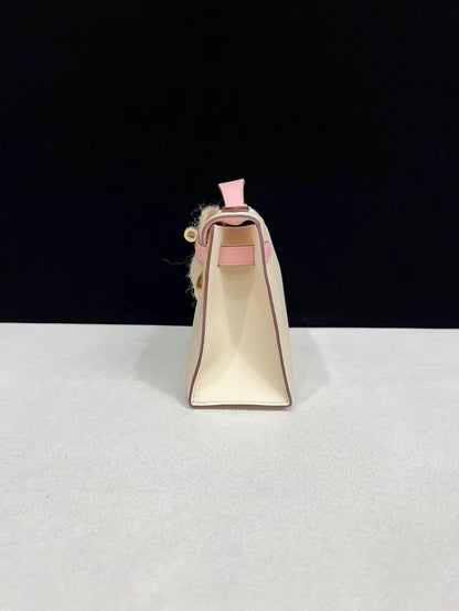 Hermes Kelly Pochette Craie & rose Sakura Pink Swift Leather with light gold hardware