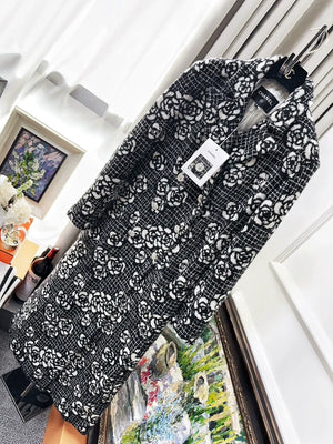 CHANEL 23K black and white camellia tweed long coat