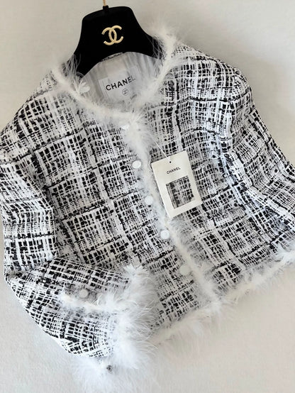 Chanel 25s black and white feather tweed jacket