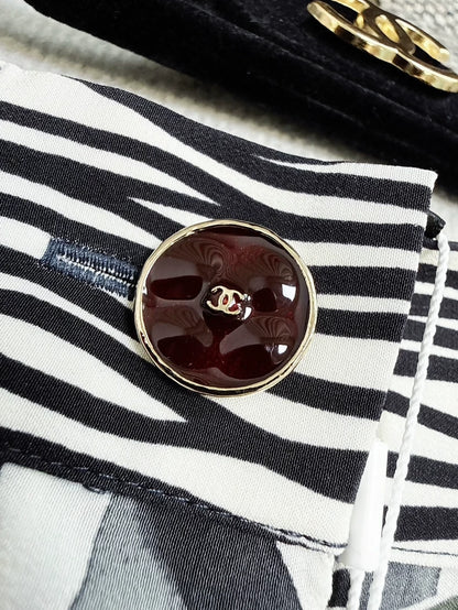 Chanel 26P black quilted silk floral shorts