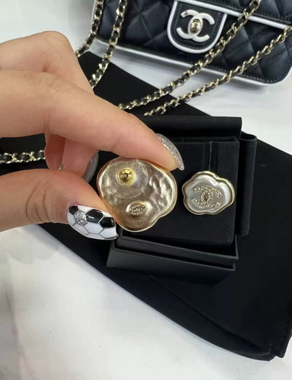 Chanel 25A mother-of-pearl cloud earrings