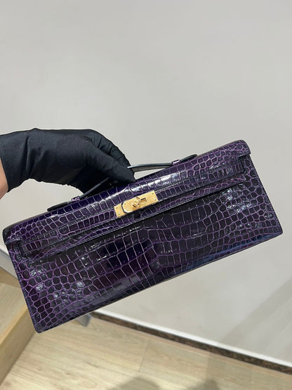 Hermes Kelly cut purple shiny crocodile leather gold hardware