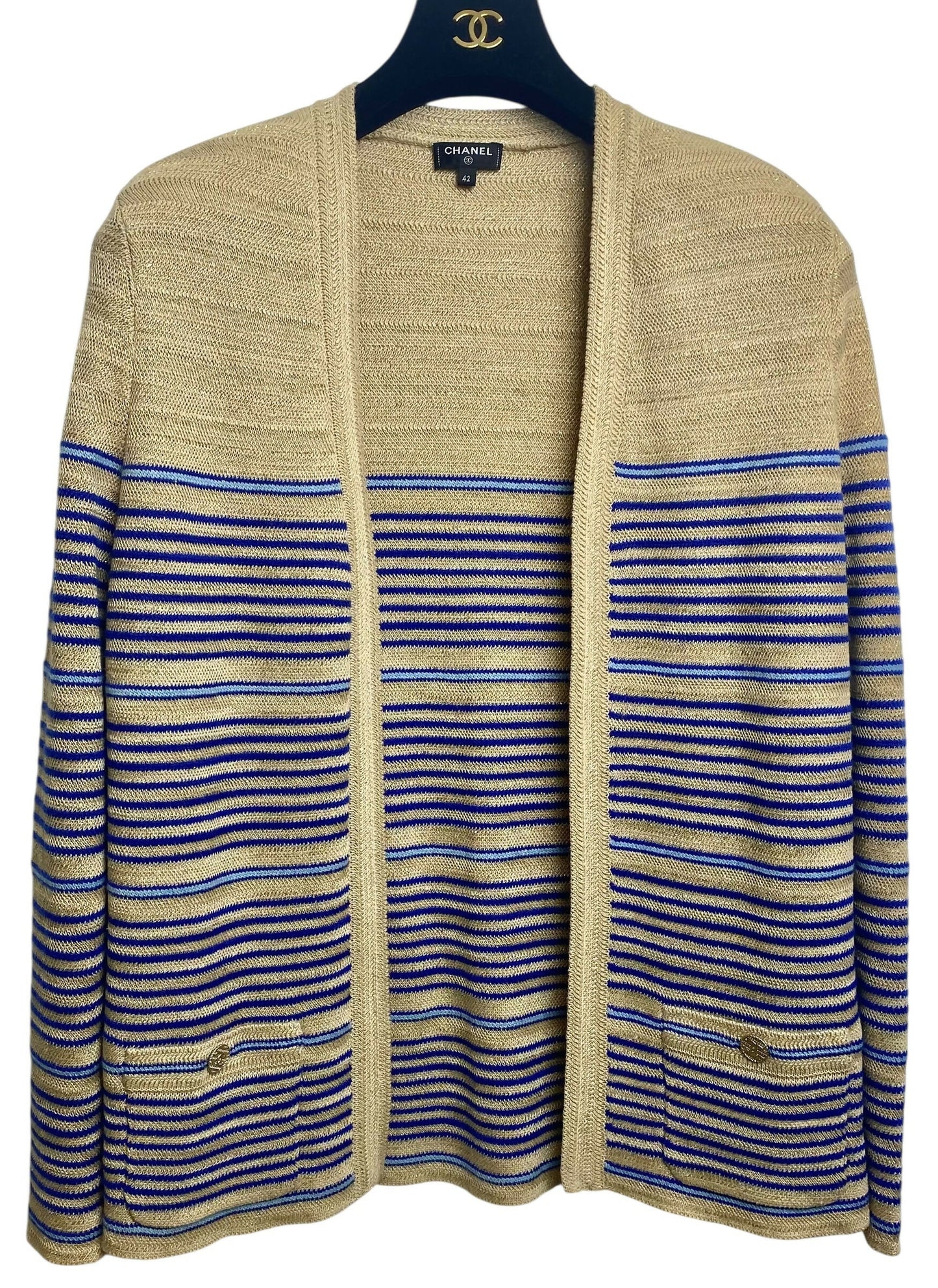From the 2019 Cruise Resort La Pausa Collection by Karl Lagerfeld. Set Retail 5.5k Chanel Outfit in Metallic Striped Cardigan in Gold, Beige, and Blue Striped Linen Cashmere Blend with Matching Skirt. 2 Gold CC Buttons on Pockets and 2 on the skirt with