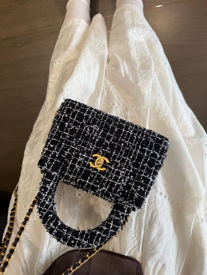 Chanel 24P Kelly Nano bag in black and white tweed