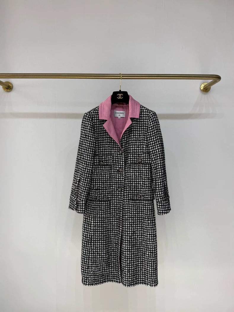 Chanel 24A long coat with black and white houndstooth pattern and pink silk lining