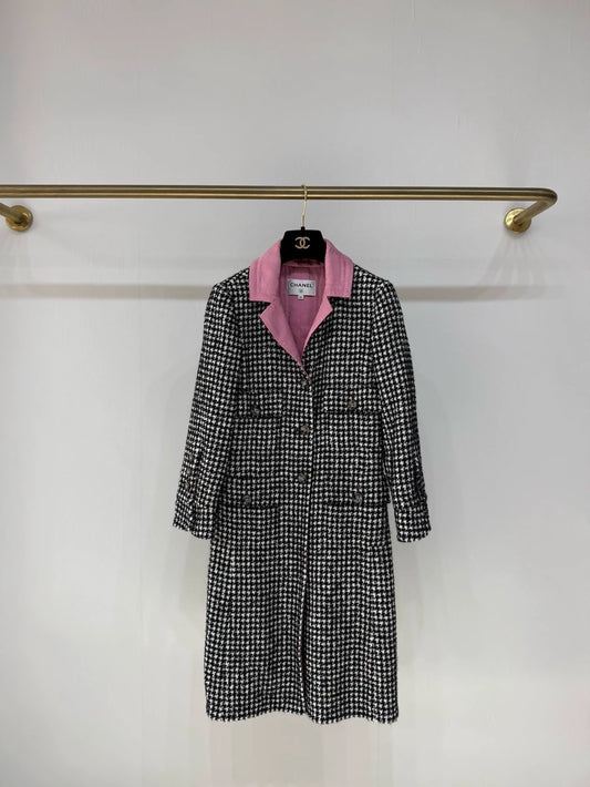 Chanel 24A long coat with black and white houndstooth pattern and pink silk lining