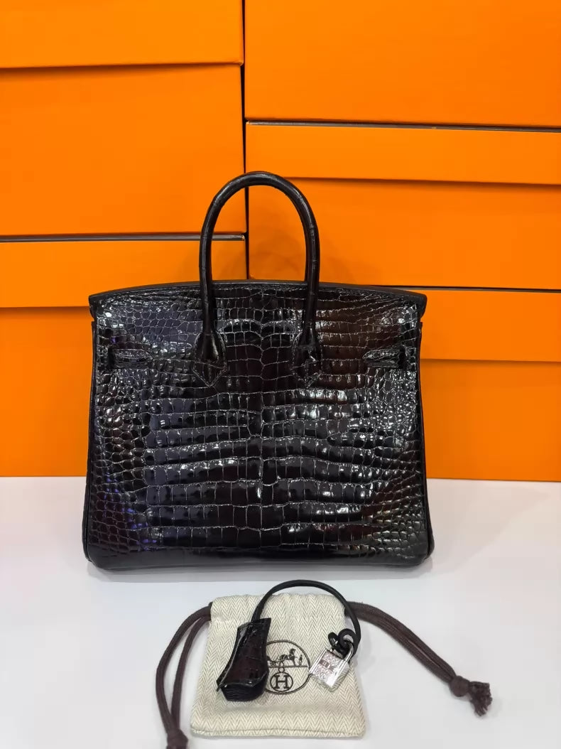 Hermes Birkin 25 black shiny leather crocodile leather with diamond hardware