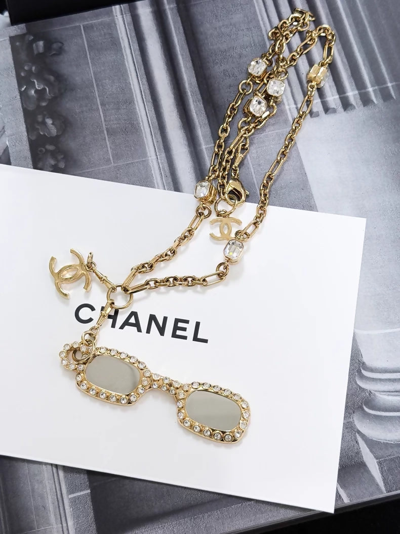 Chanel 24s gold-plated sunglasses-style long chain necklace