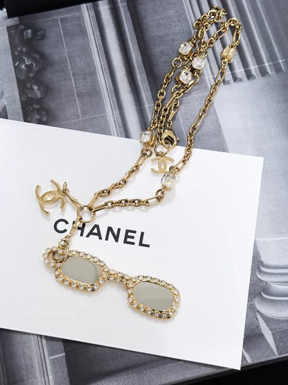 Chanel 24s gold-plated sunglasses-style long chain necklace