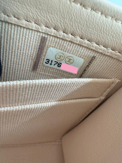 Chanel peach quilted leather coin purse with gold chain strap