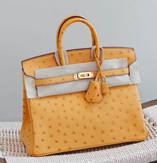 Hermes Birkin 25 saffron ostrich leather gold hardware